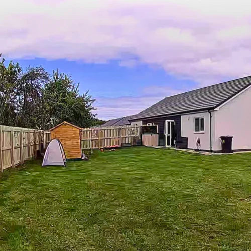 Customer security camera view of a back garden
